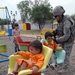Multi-National Division - Baghdad Soldiers help turn abandoned private carnival into public park