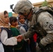 Soldiers distribute school supplies to Iraqi Students