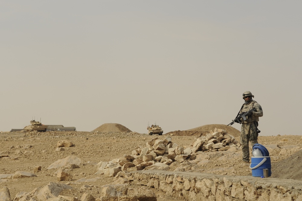 Grim Troop helps Iraqi police