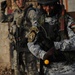 Iraqi national police, U.S. Soldiers hand out handbills