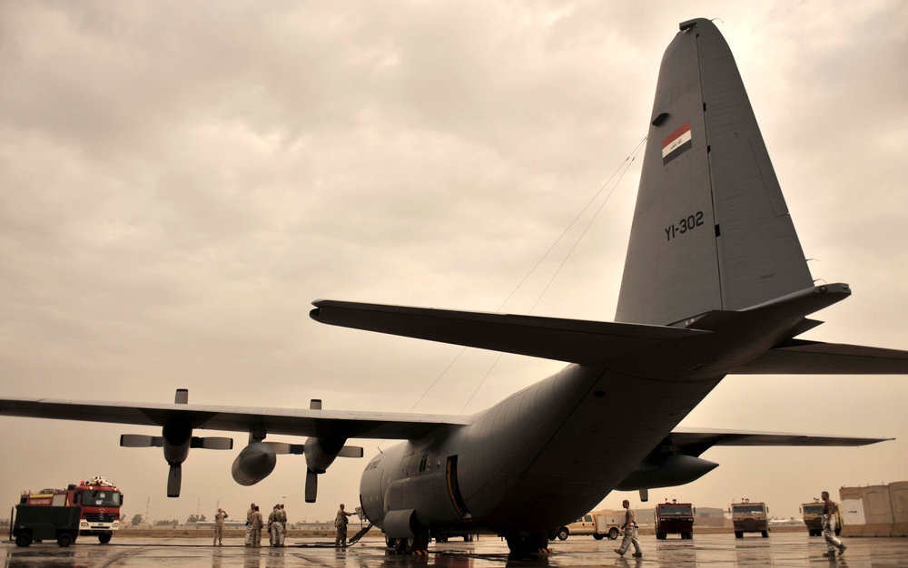 Iraqi, American Firefighters Combine Forces for Airfield Protection