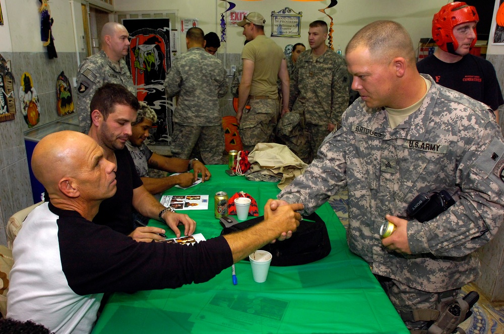 Multi-National Division - Baghdad Soldiers receive Halloween treat from mixed martial arts fighters