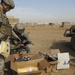 U.S. Soldiers hand out food and supplies