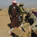 U.S. Soldiers Hand Out Food and Supplies