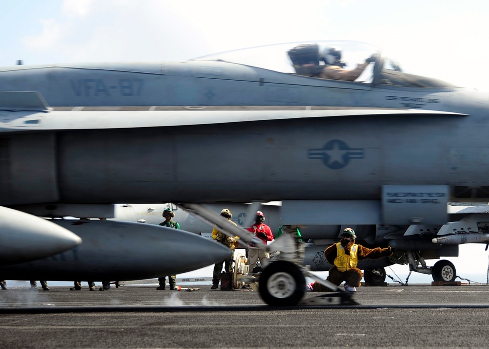 Launching Hornets aboard the USS Theodore Roosevelt