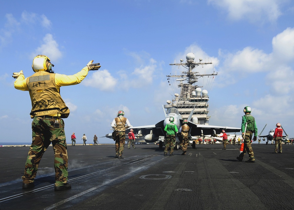 Launching Hornets aboard the USS Theodore Roosevelt