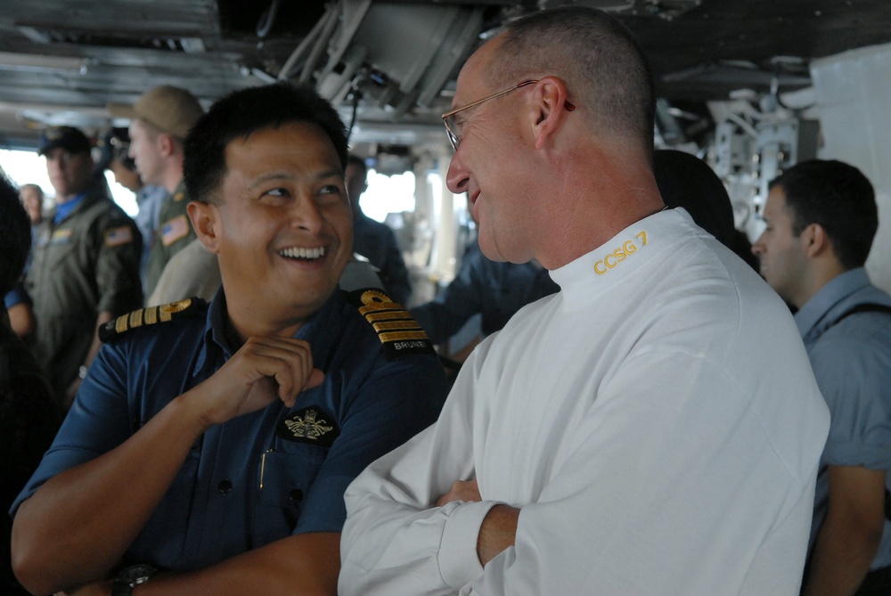 Members of Brunei military tour USS Ronald Reagan