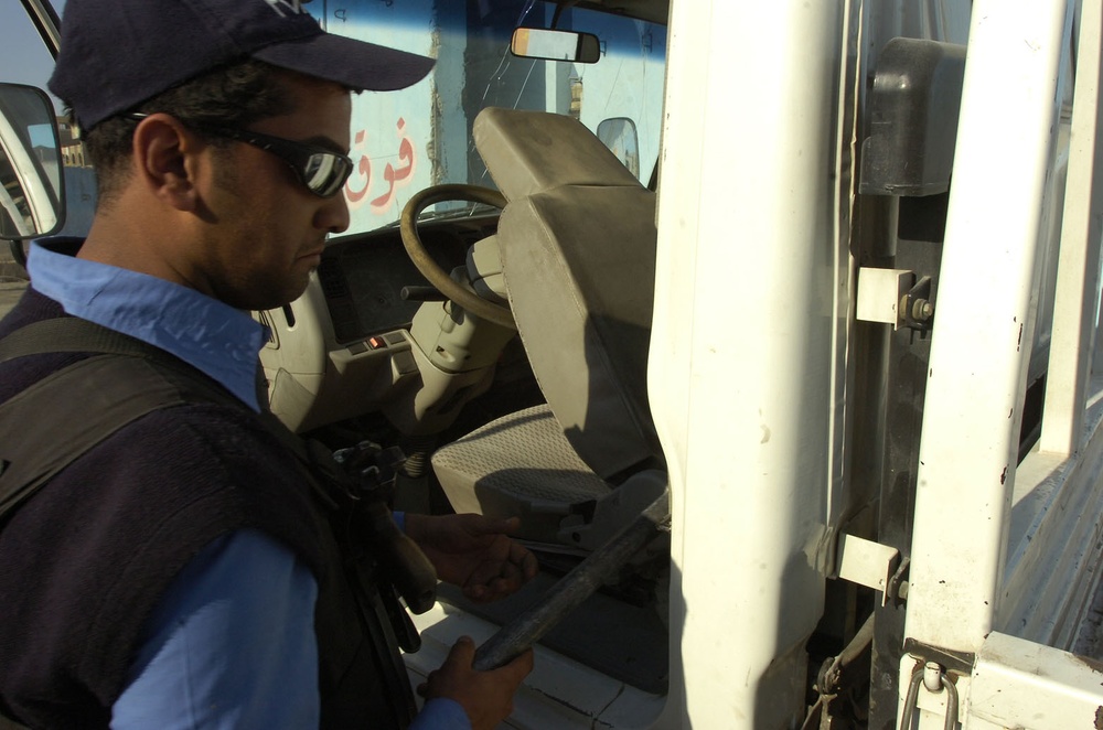 Iraqi Police keep peace at Sadr City checkpoints