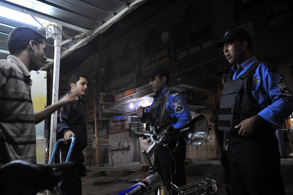 Airmen Conduct Police Transition Team Operations in Baghdad