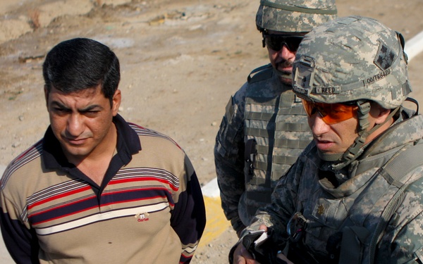 Iraqi government pays its 'Sons': West Rashid Sons of Iraq receive first government of Iraq paycheck