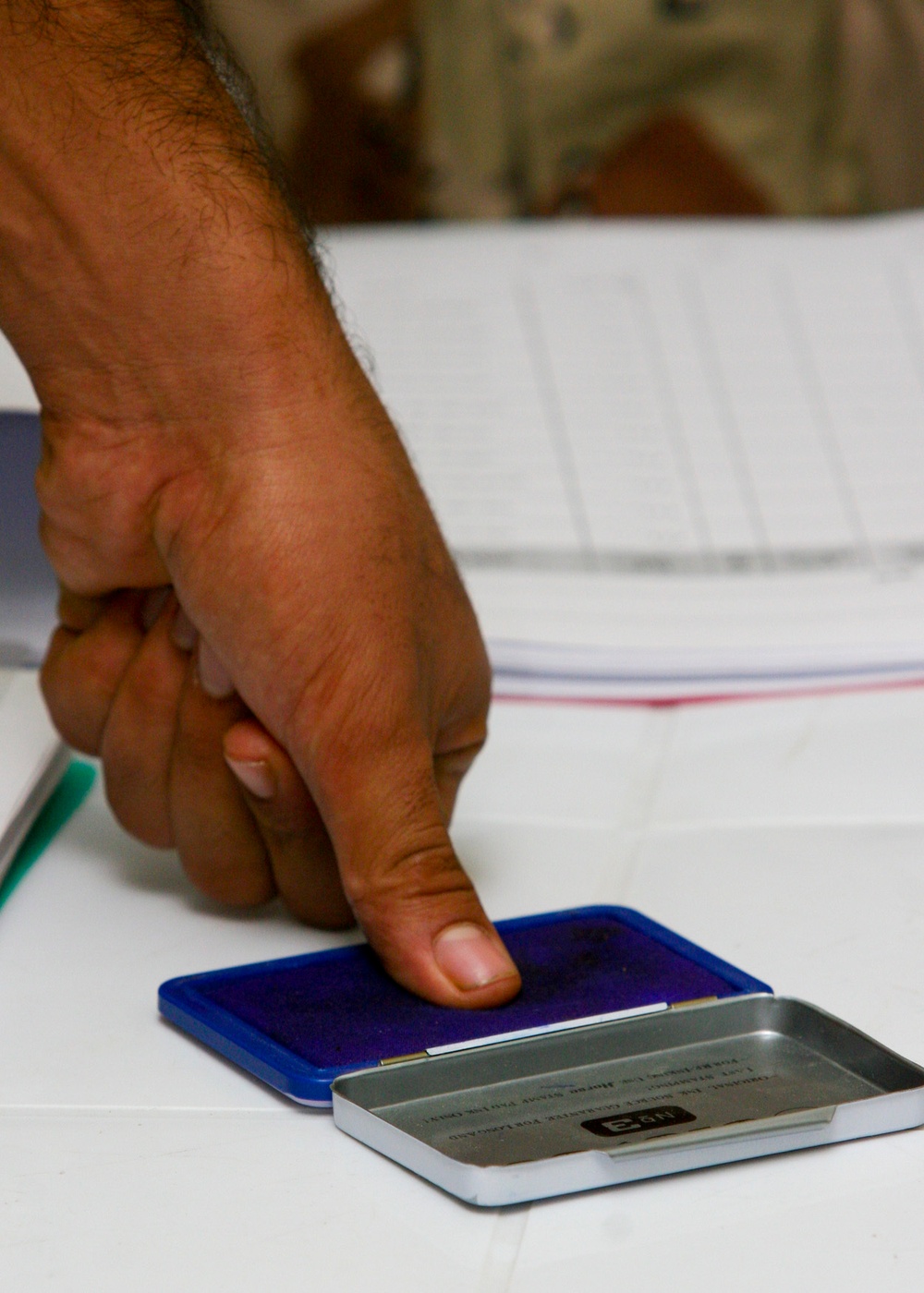 Iraqi government pays its 'Sons': West Rashid Sons of Iraq receive first government of Iraq paycheck