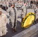 Representatives of each of the services assigned to Combined Security Transition Command - Afghanistan stand at attention after the laying of the wreath during the Veterans Day ceremony held at Camp Eggers in Kabul, Nov. 11, 2008. More than 200 U.S. and c