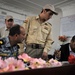 Iraqi national police distribute paychecks to Sons of Iraq