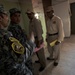 Iraqi national police distribute paychecks to Sons of Iraq