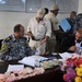 Iraqi national police distribute paychecks to Sons of Iraq