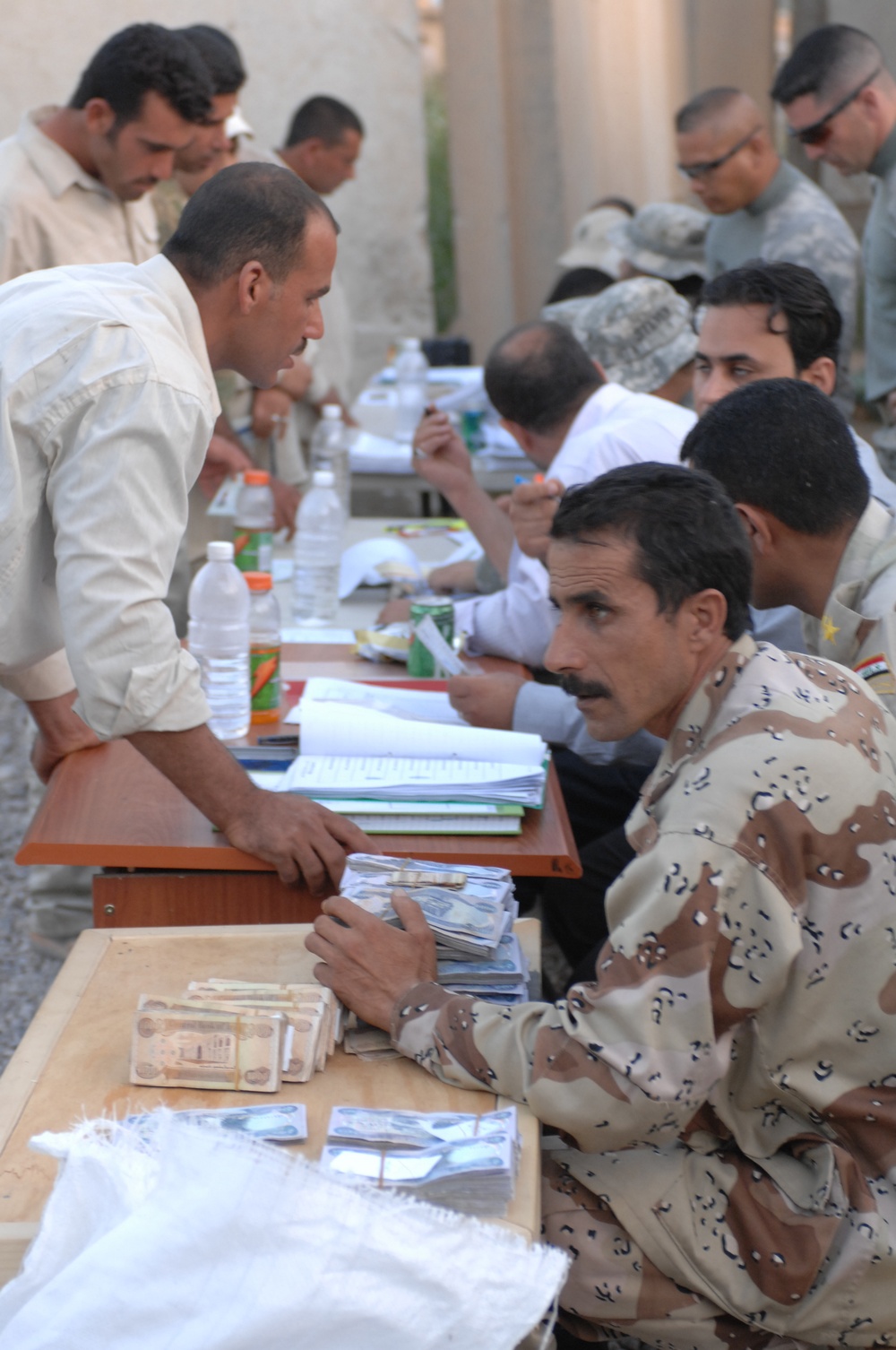 Sons of Iraq receive checks during Iraqi government-sponsored payday