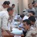 Sons of Iraq receive checks during Iraqi government-sponsored payday