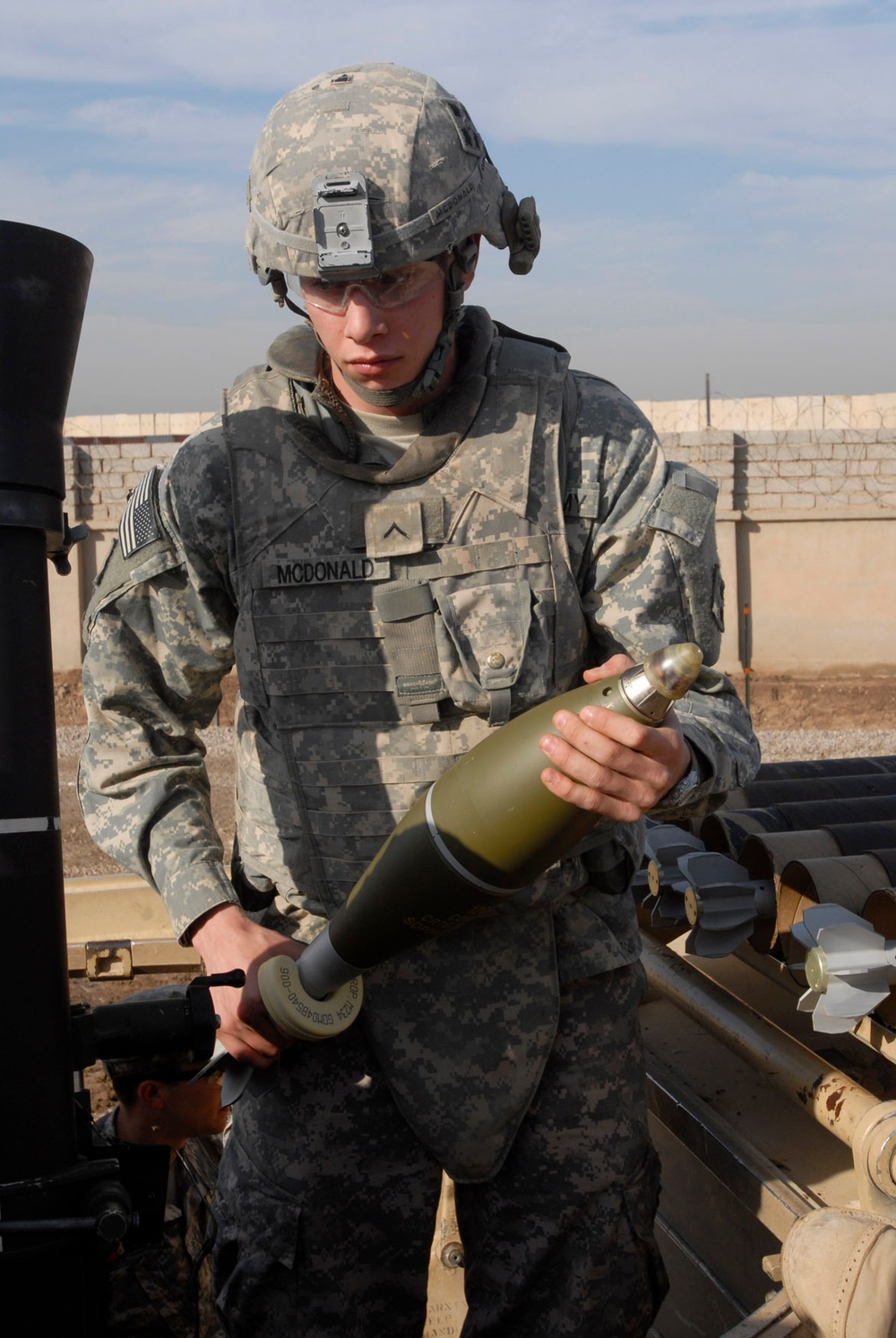 Regulars lob mortar rounds at Forward Operating Base Falcon