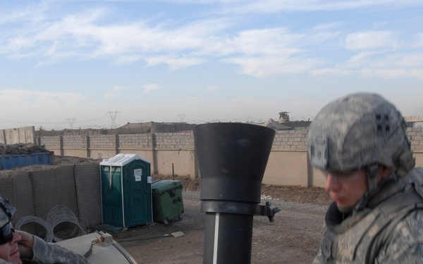 Regulars lob mortar rounds at Forward Operating Base Falcon