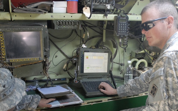 Regulars lob mortar rounds at Forward Operating Base Falcon