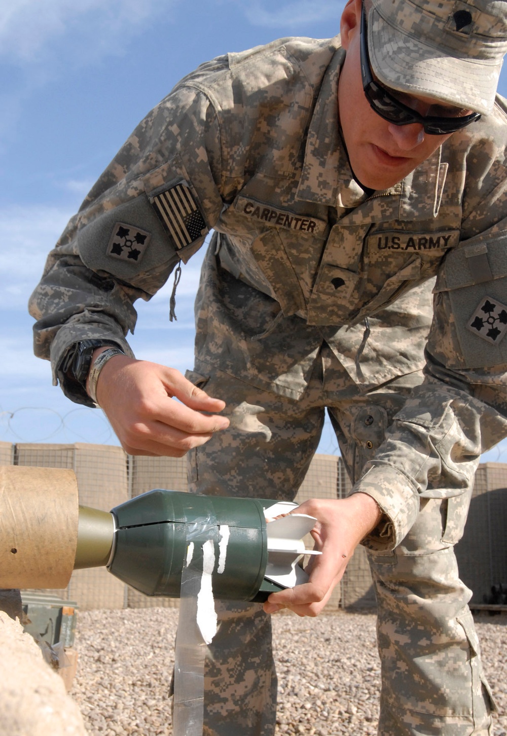 Regulars lob mortar rounds at Forward Operating Base Falcon