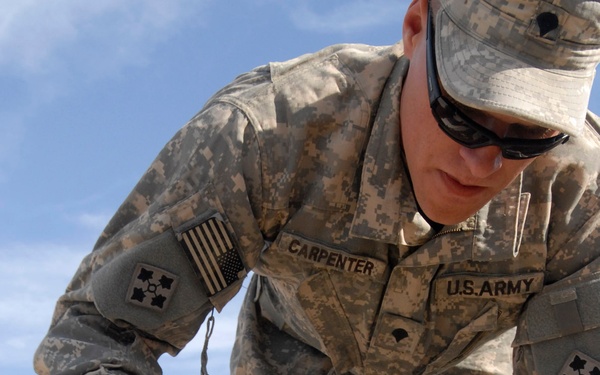 Regulars lob mortar rounds at Forward Operating Base Falcon