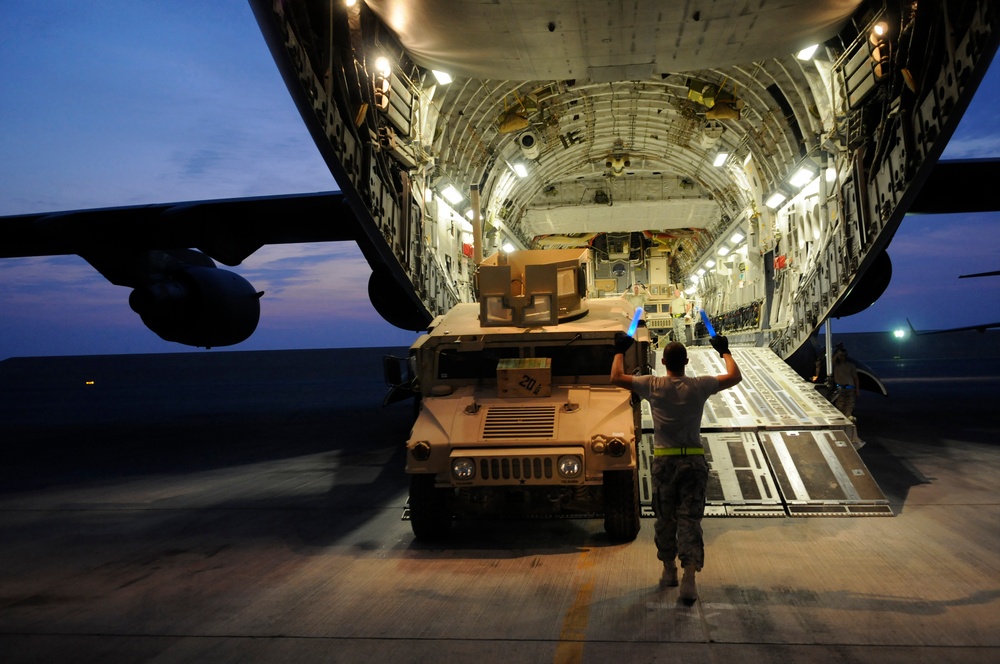 Humvees on a Plane