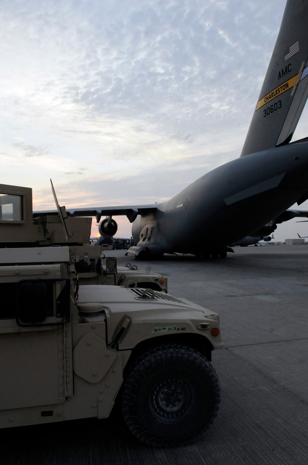Humvees on a Plane
