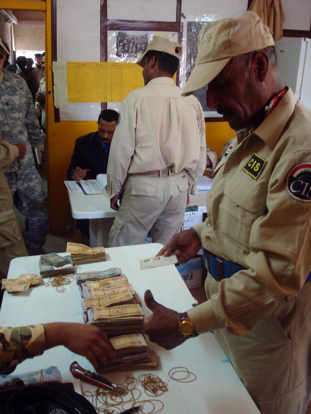 Hammer Co. transitions to over-watch as government of Iraq conducts their first pay day