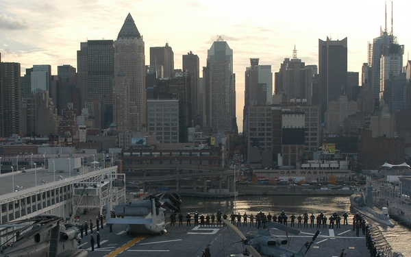 Manning the rails while departing the Big Apple