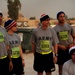 U.S. military members line up to participate in the 10K Veterans Day memorial run at Forward Operating Base Rustamiyah, Iraq, on Nov. 11, 2008.