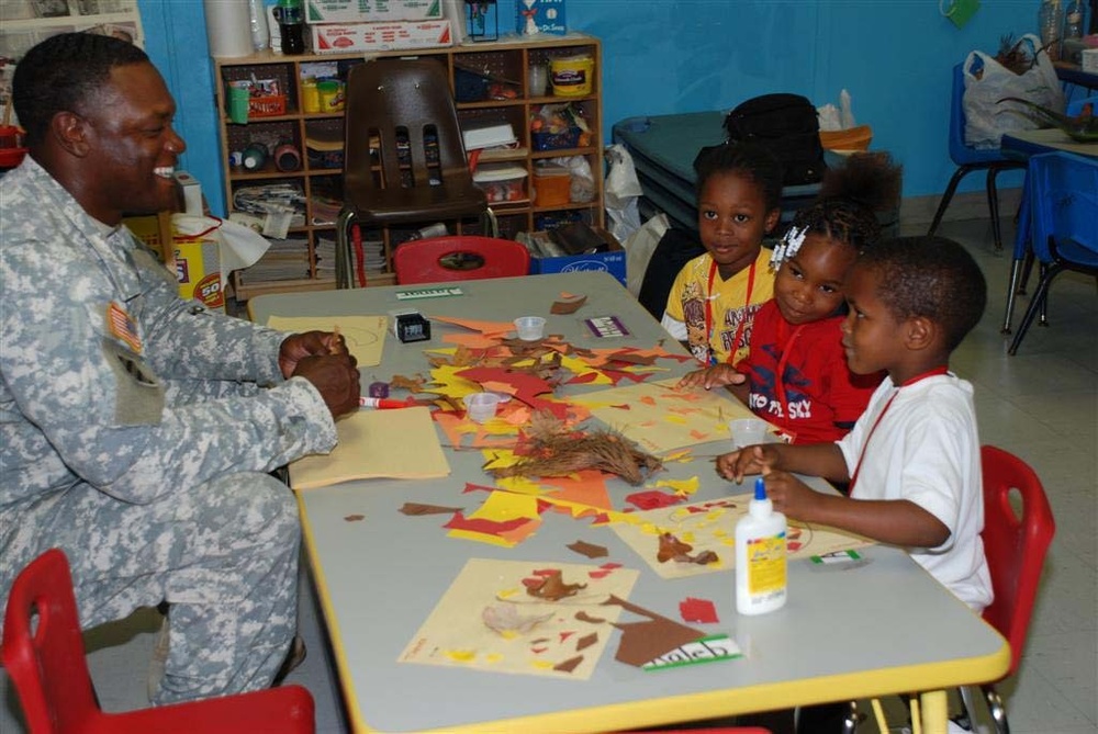 Troops make big impact on small children