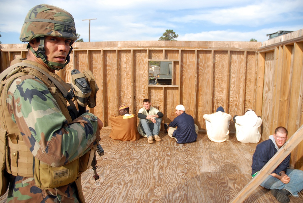 In action at Camp Shelby