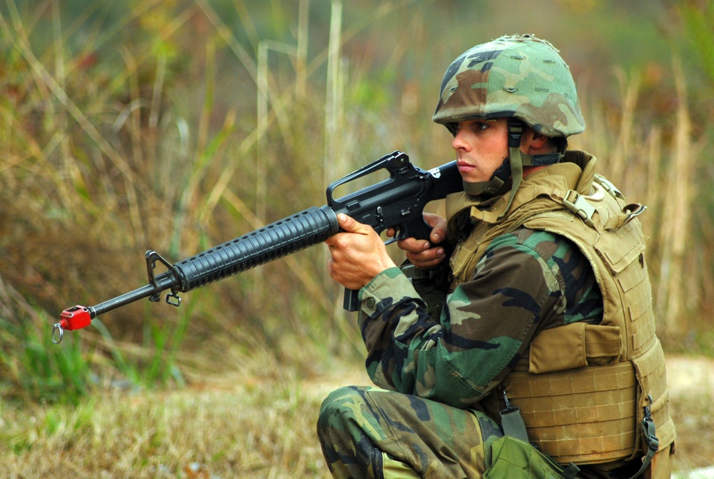 In action at Camp Shelby