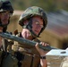 In action at Camp Shelby