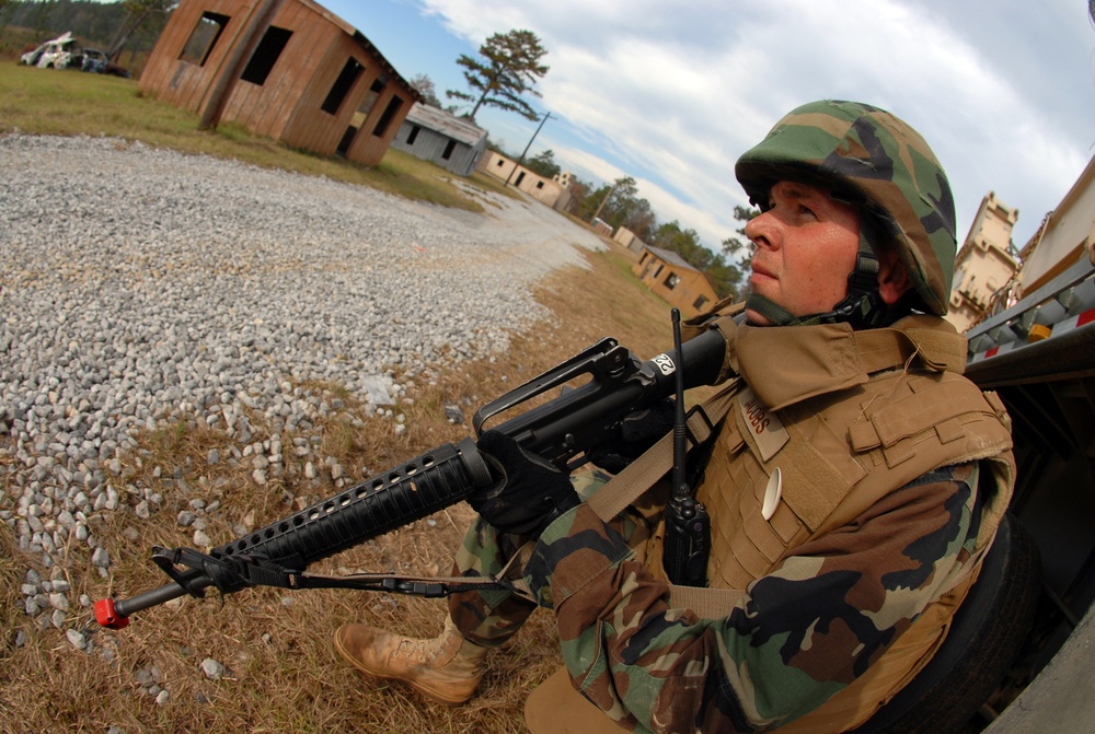 In action at Camp Shelby