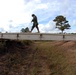 In action at Camp Shelby