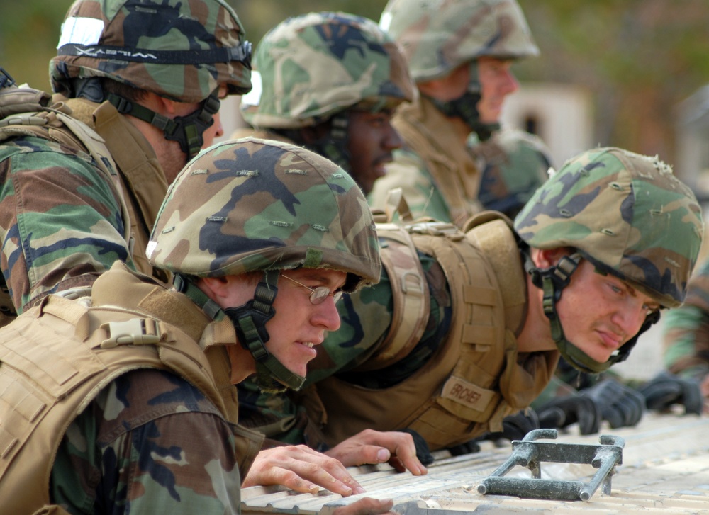 In action at Camp Shelby