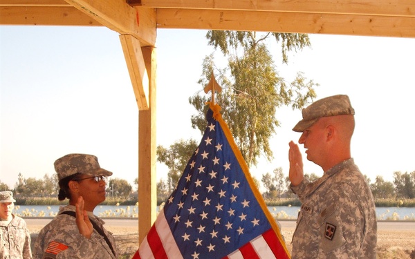 Soldier raises hand for service
