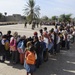 Iraqi, U.S. Soldiers team up with El Salvadoran army to distribute food