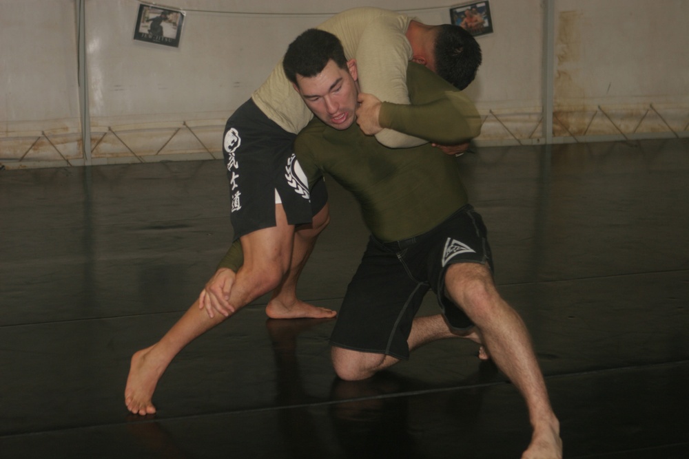 Marines grapple with jiu-jitsu in deployed dojo