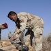 Iraqi army Explosive Ordnance Disposal team clear base of old munitions