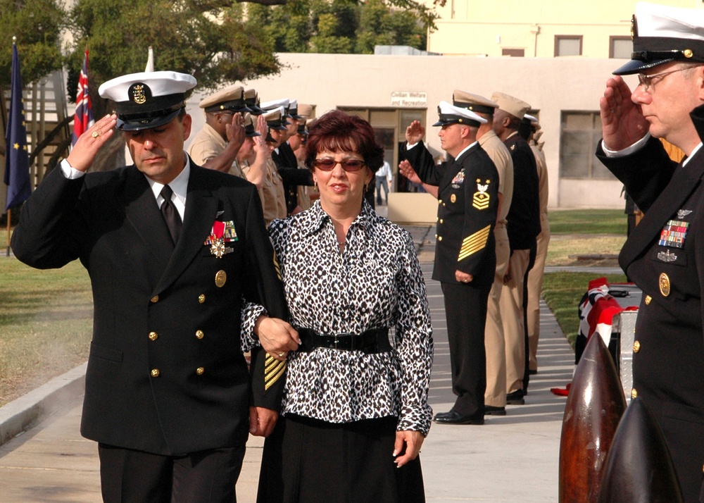 Master Chief Petty Officer James Abeyta piped ashore for last time