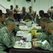 Multi-National Division - Baghdad Military Police Commander troops for 2nd straight deployed serving of Thanksgiving dinner