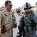 Iraqi army soldiers stand in lead during joint patrol