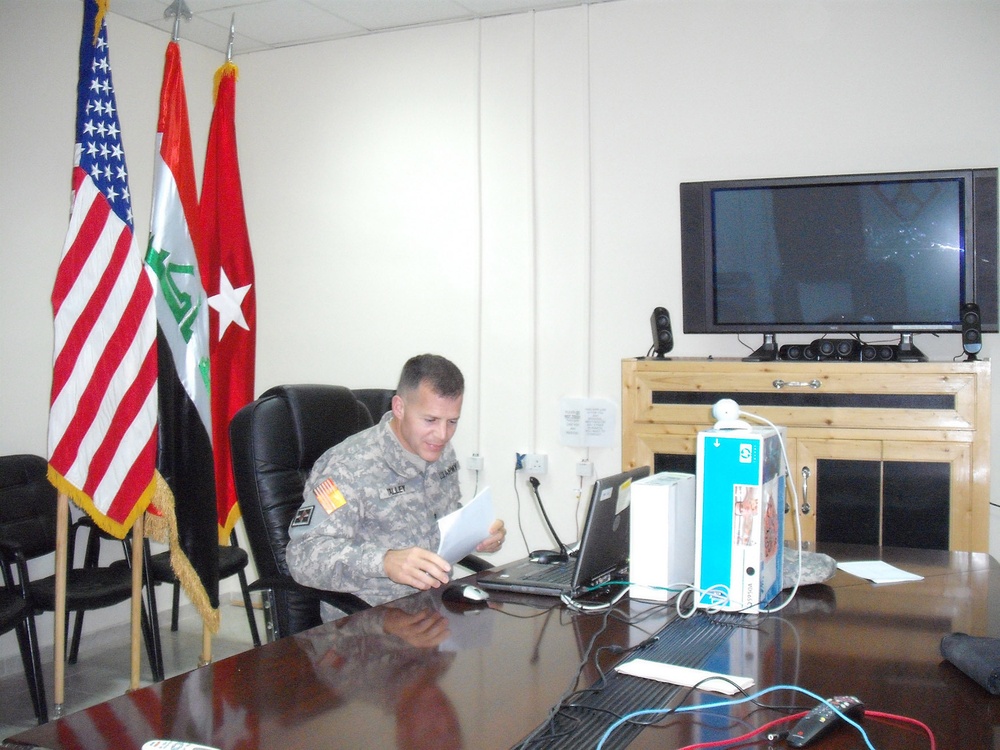 Brigade commander speaks via video link from Baghdad to Illinois conference