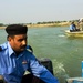 Iraqi Police, Military Police perform joint river patrol, first in Kut