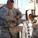 Sgt. Salvador Ramirez, a native of Vernon, Texas, and driver for the 1st Sustainment Brigade personal security detail, dons his gear before heading out on a mission, Nov. 10. The team safely escorted members of the brigade to Joint Base Balad for a mass r