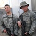 Soldiers give thanks for meal, buddy