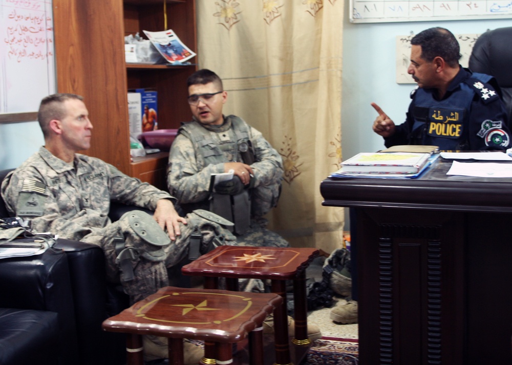 Iraqi Police commander discusses concerns with brigade commander